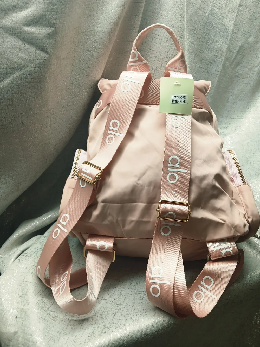 ALO Yoga Blush Pink Drawstring Backpack with Gold Hardware